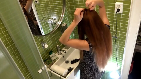 The cutest redhead skinny girlfriend gets her hair done in the bathroom without panties or bra in a sexy dress